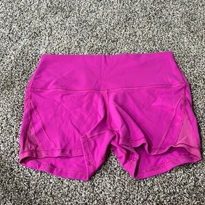 Magenta pink Lululemon spandex shorts. Size 8.